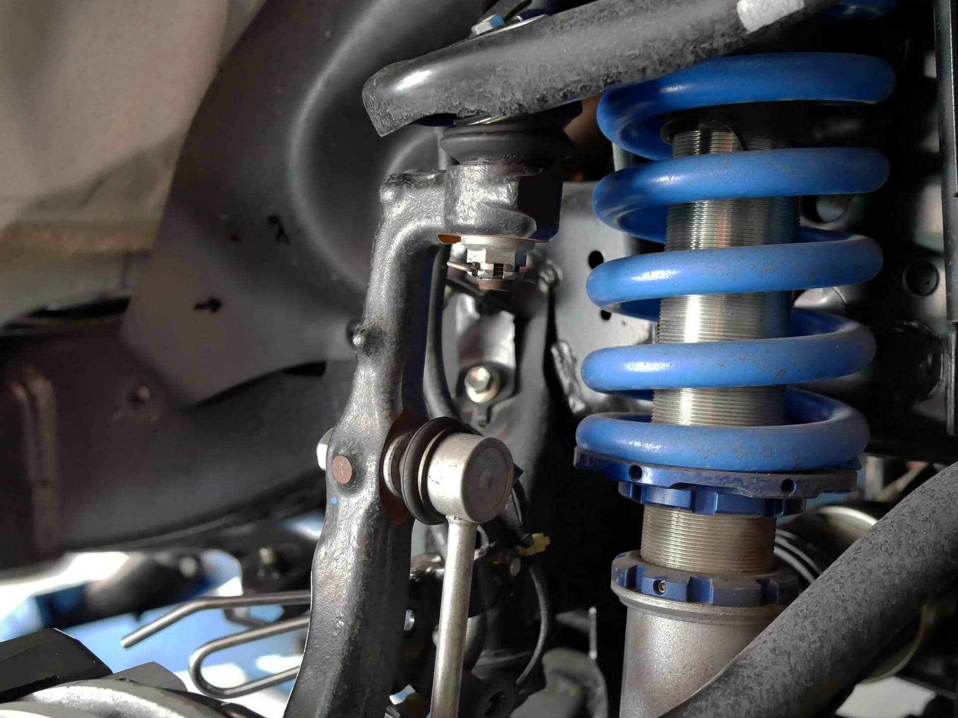 Mechanic Maintaining A Car